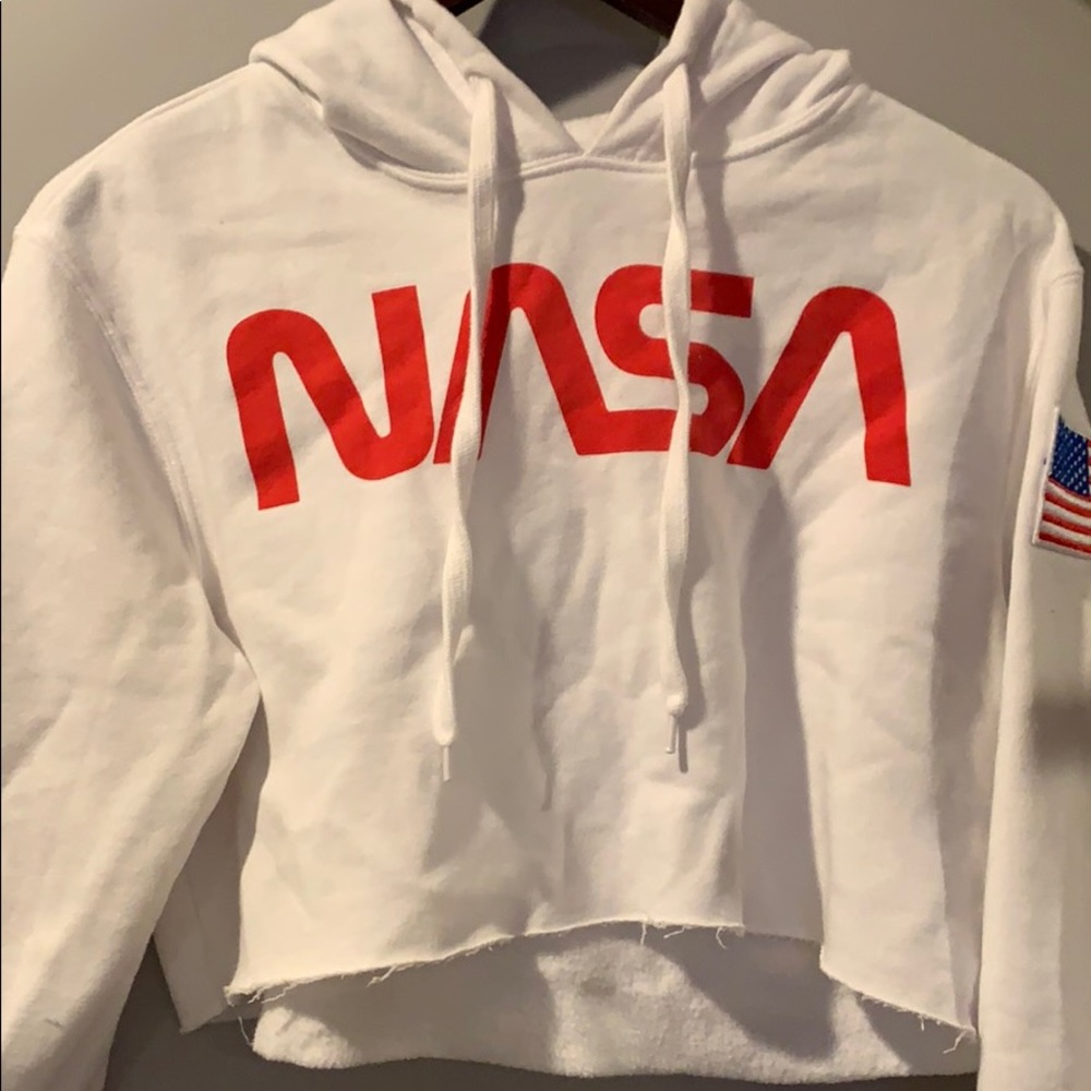 A cropped NASA white sweatshirt with hood.